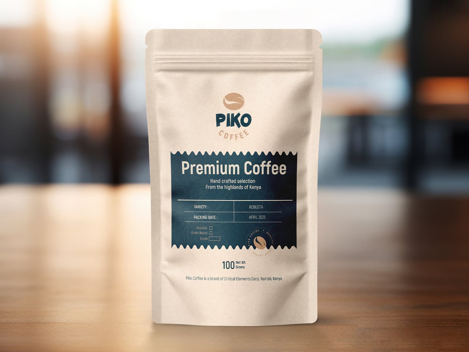 A kraft-paper Piko Coffee pouch standing on a wooden counter, its label reading Premium Coffee, hand crafted selection from the highlands of Kenya.